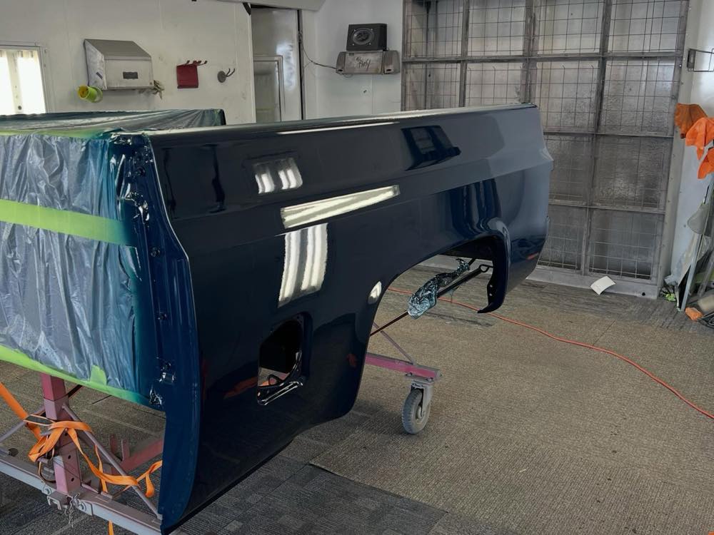 Square-body pickup: Masked and prepped in the paint booth